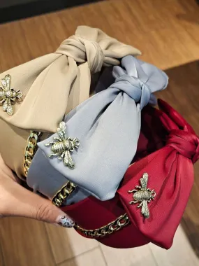 All That Ritz Bow and Chain Satin Headband All That Ritz Bow and Chain Satin Headband