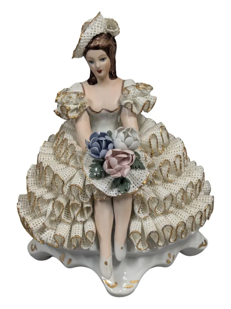 Antique Roceram Romania porcelain figurine, lady sitting holding flowers