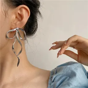 Getadme Korean Design Fashion Simple Silver Color Metal Line Bow Earrings Elegant Big Long Bowknot Drop Earrings Female Getadme Korean Design Fashion Simple Silver Color Metal Line Bow Earrings Elegant Big Long Bowknot Drop Earrings Female